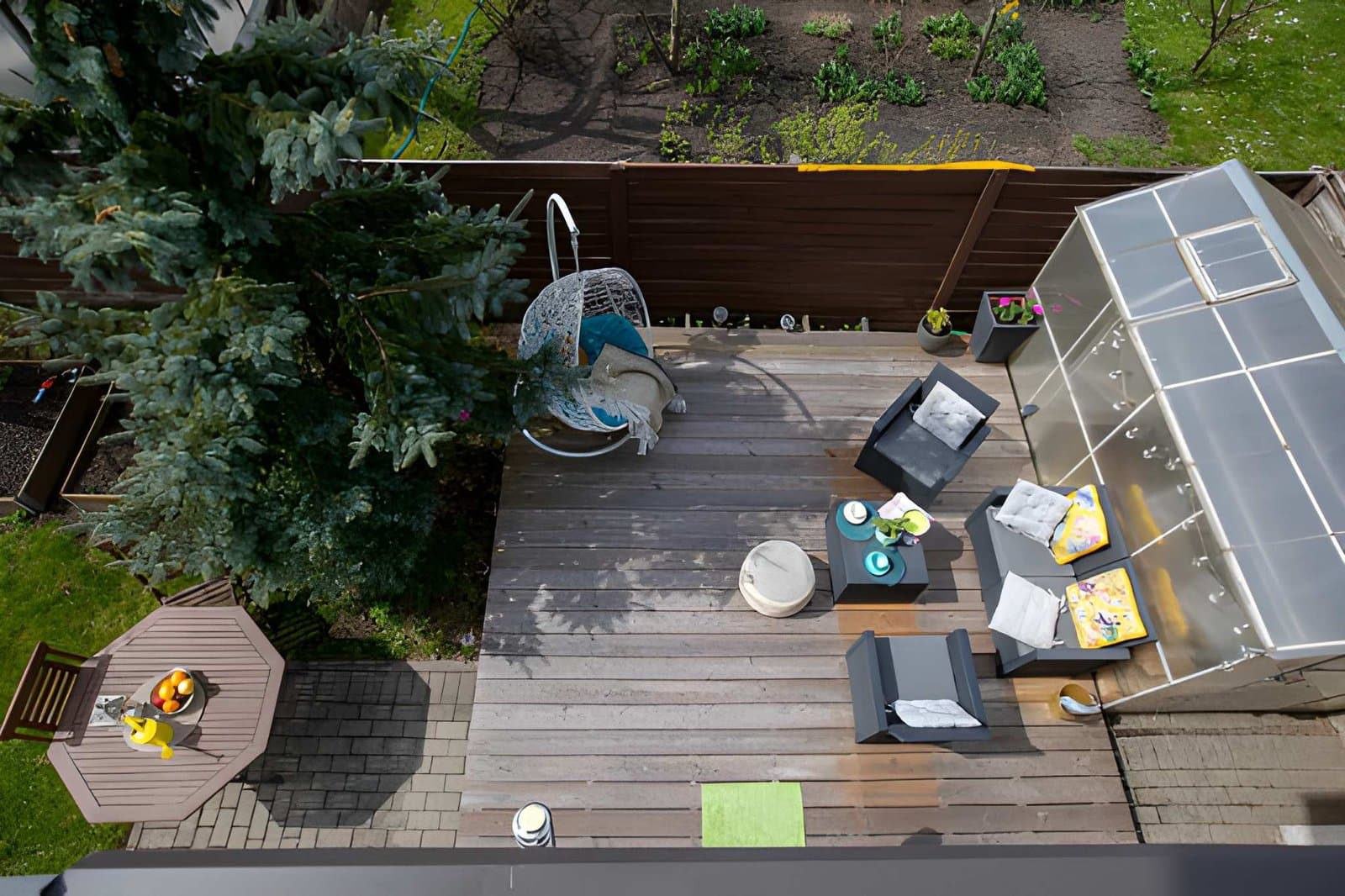 Finished backyard deck with outdoor living space
